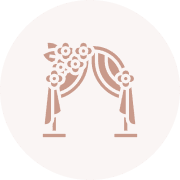 Here's an alt tag for the image: Floral wedding ceremony arch.