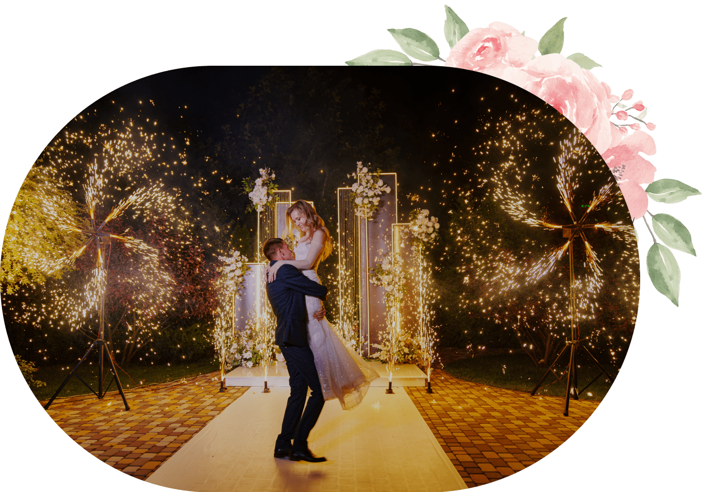 Wedding couple dancing with fireworks.