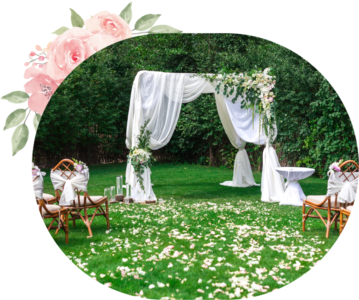 Outdoor wedding ceremony, floral arch, petals.