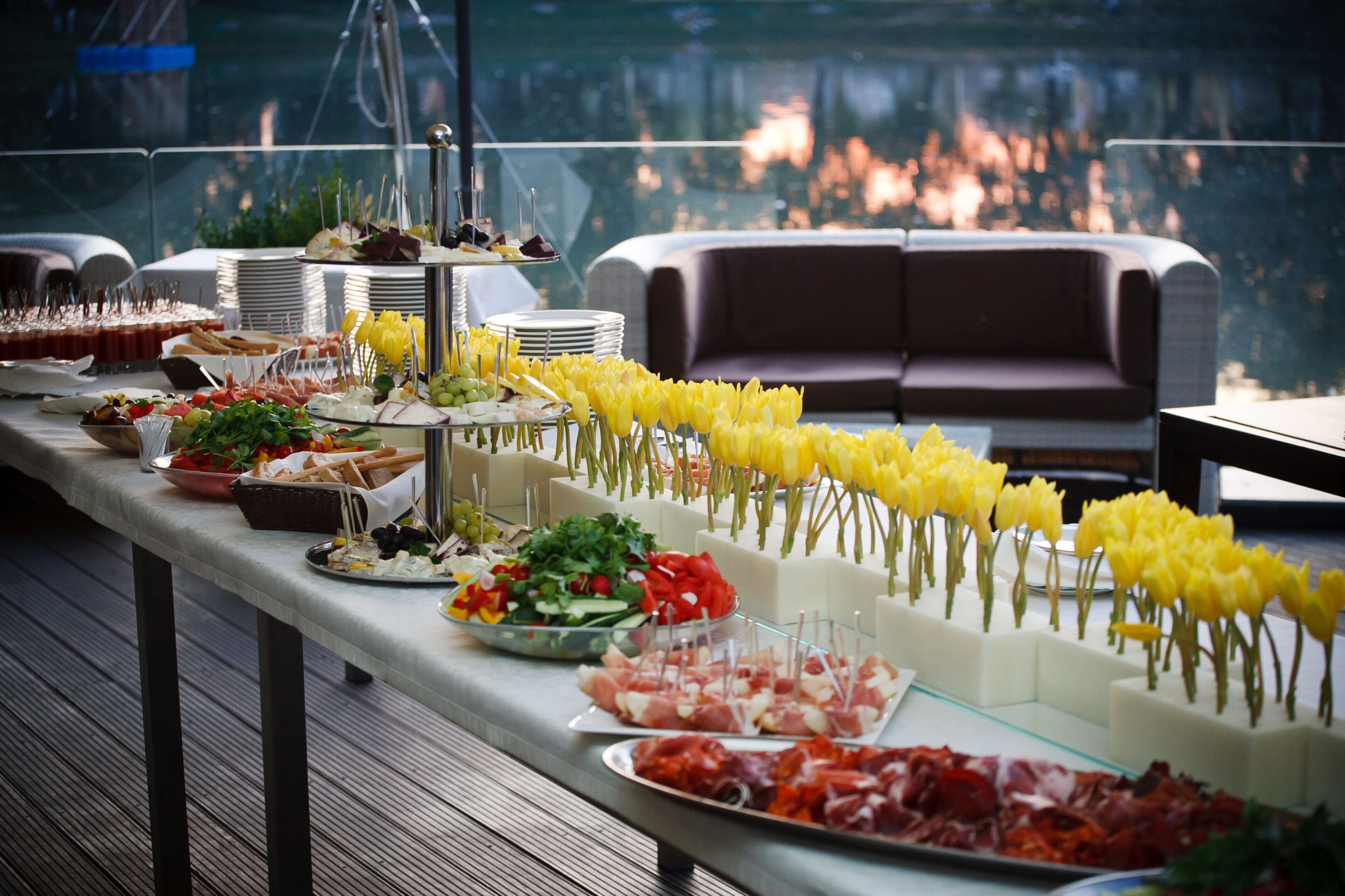 Buffet line of lunch and dinner.Buffet self-service food Delicious buffet with yellow tulips.